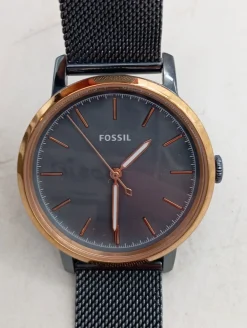 Analoguhr-Fossil Clearance