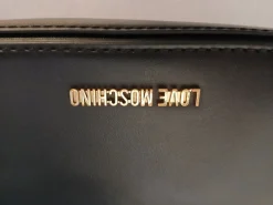 Henkeltasche- Online