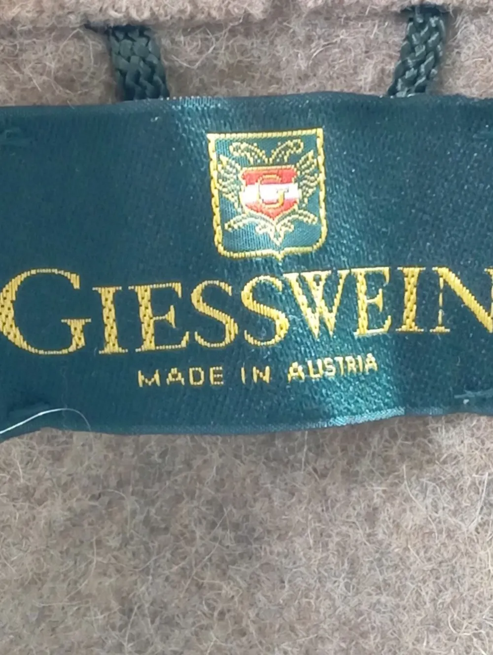 Strickbekleidung>Giesswein Strickjacke Größe 44 braunschwarz