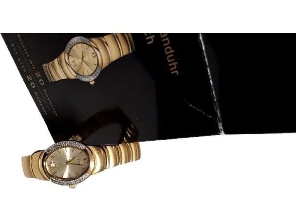 Uhren>Tchibo Uhr goldfarben